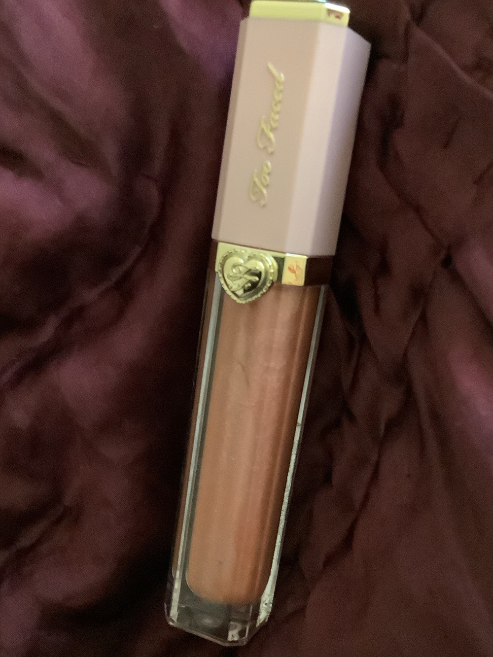Too Faced “ you up” is shade Nude Pink Lip Gloss with Gold Accents Shimmer gloss